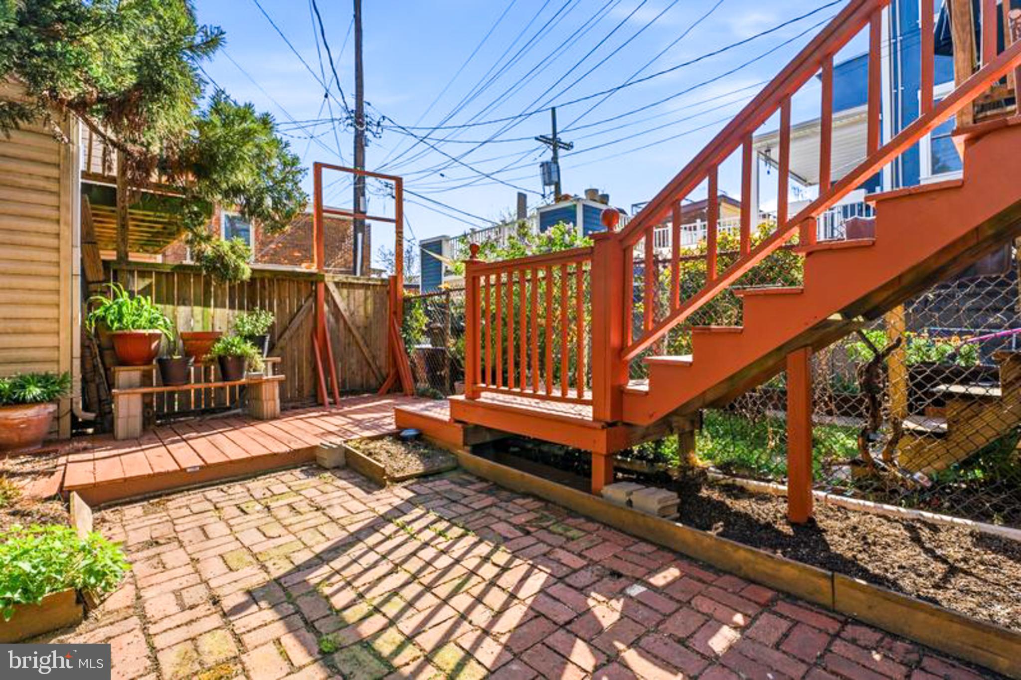 2033 East Pratt Street Baltimore, MD 21231 - Photo 53 of 61 a view of a backyard with a bench