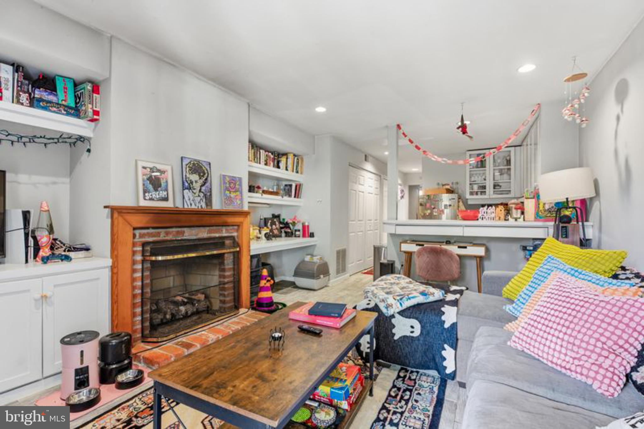 2033 East Pratt Street Baltimore, MD 21231 - Photo 54 of 61 a living room with furniture and a fireplace