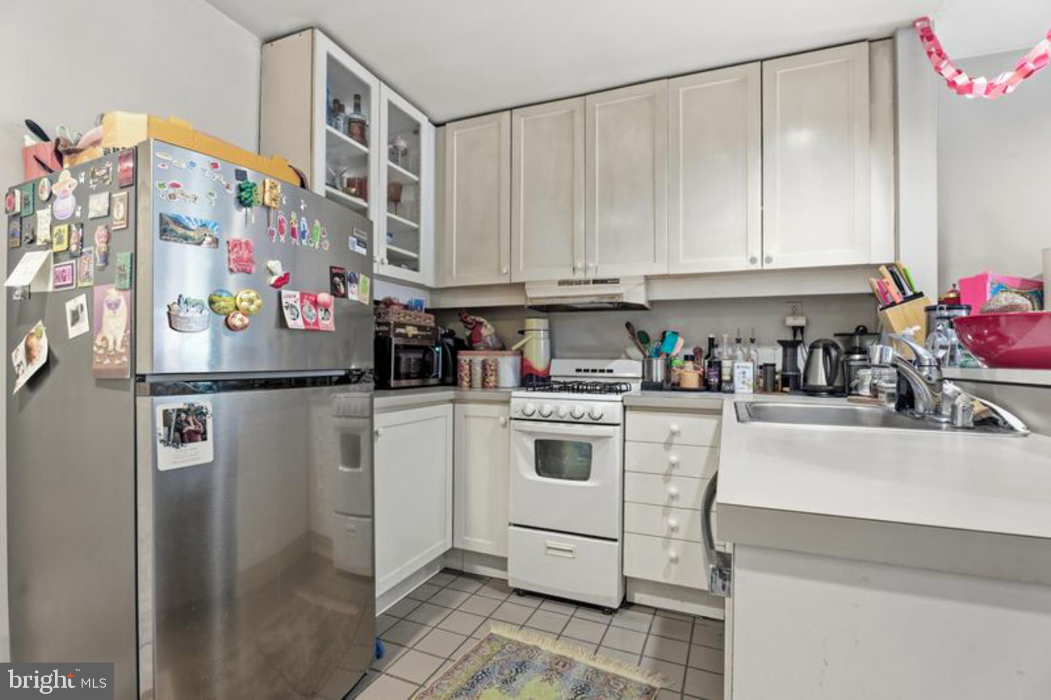 2033 East Pratt Street Baltimore, MD 21231 - Photo 56 of 61 a kitchen with stainless steel appliances a refrigerator and sink