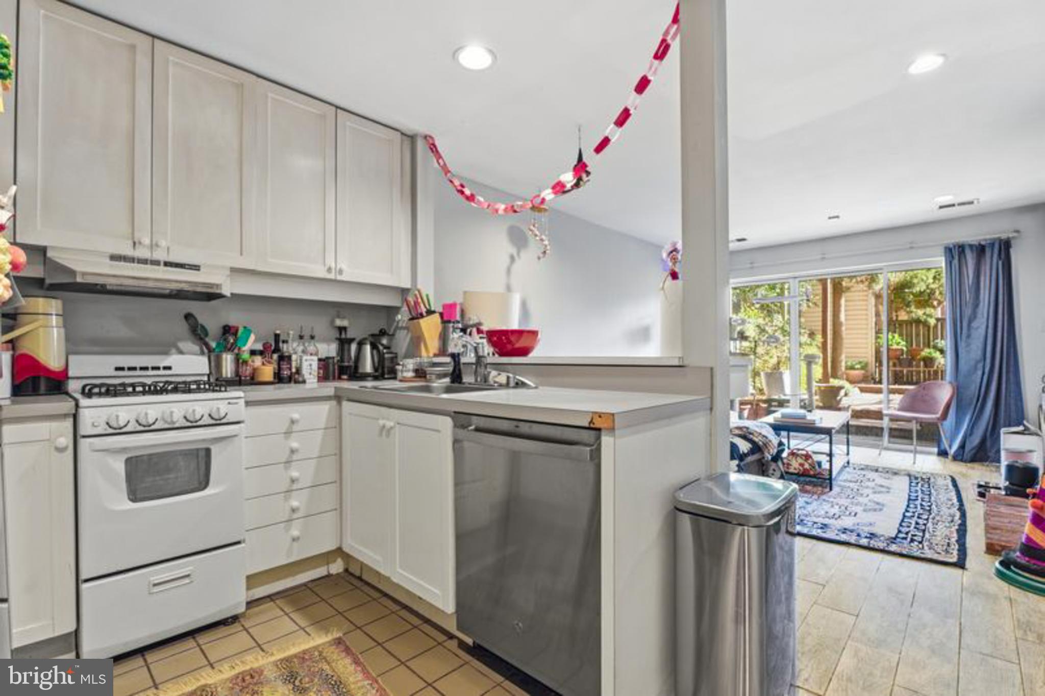 2033 East Pratt Street Baltimore, MD 21231 - Photo 57 of 61 a kitchen with a sink cabinets and window