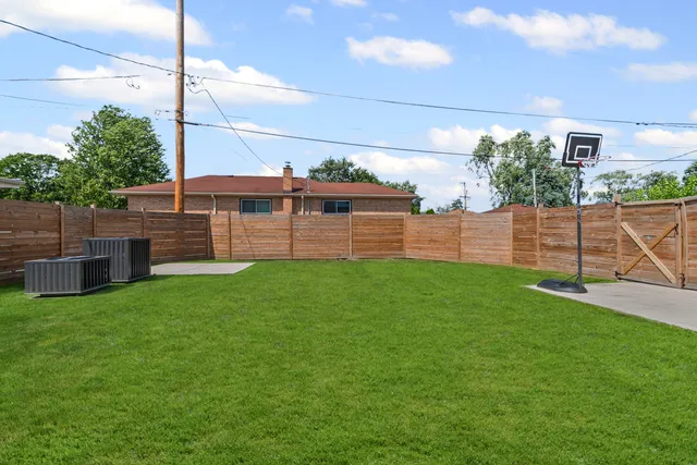 a view of a backyard with a garden