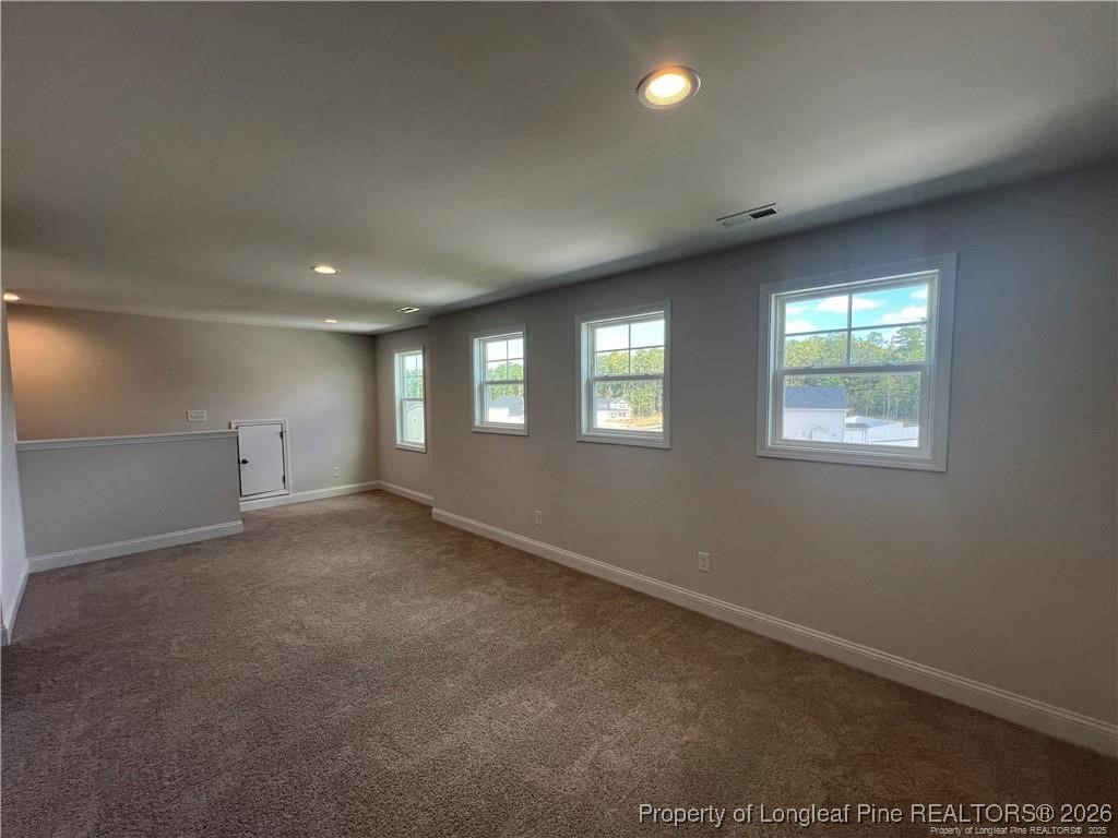 3870 Blackhills Road Fayetteville, NC 28311 - Photo 14 of 22 an empty room with windows