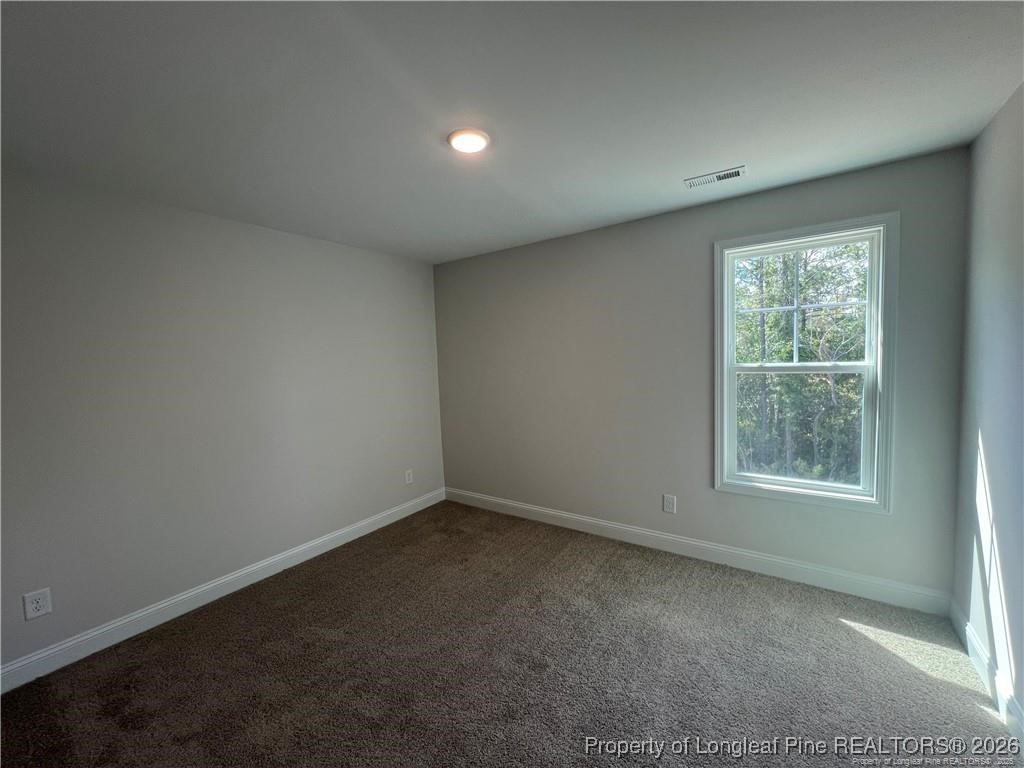3870 Blackhills Road Fayetteville, NC 28311 - Photo 17 of 22 an empty room with a window