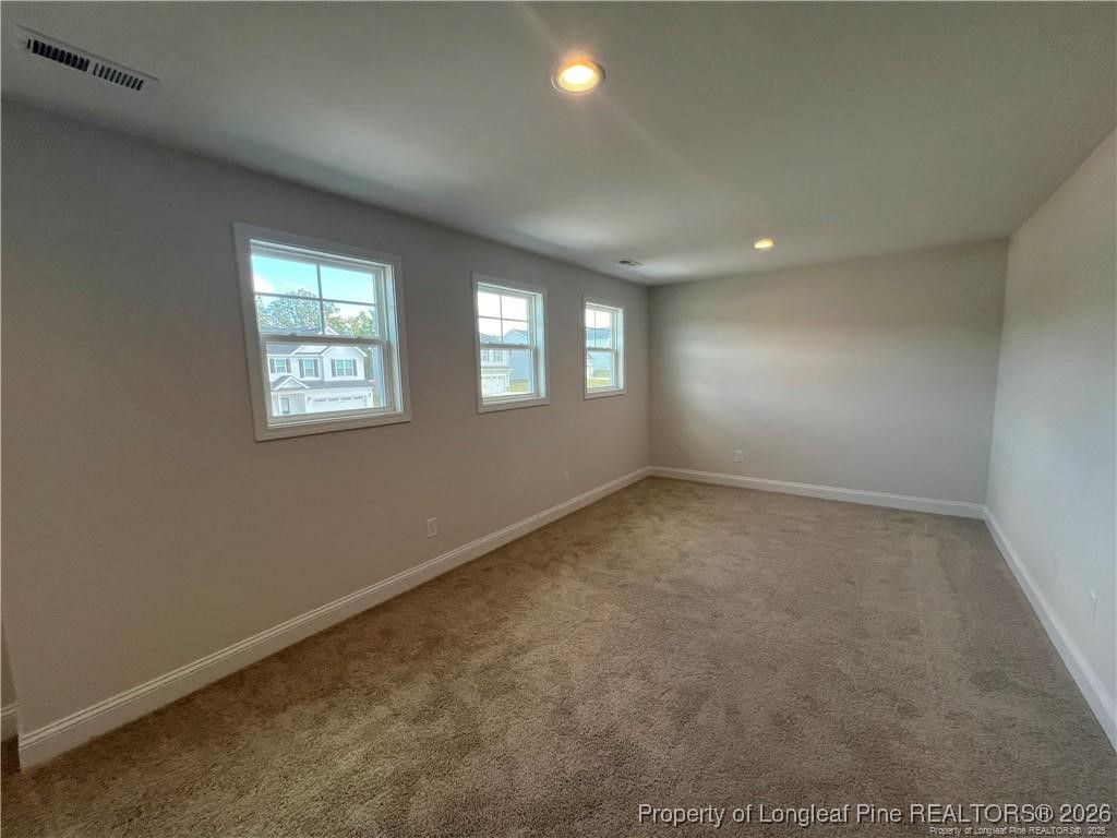 3870 Blackhills Road Fayetteville, NC 28311 - Photo 19 of 22 an empty room with windows