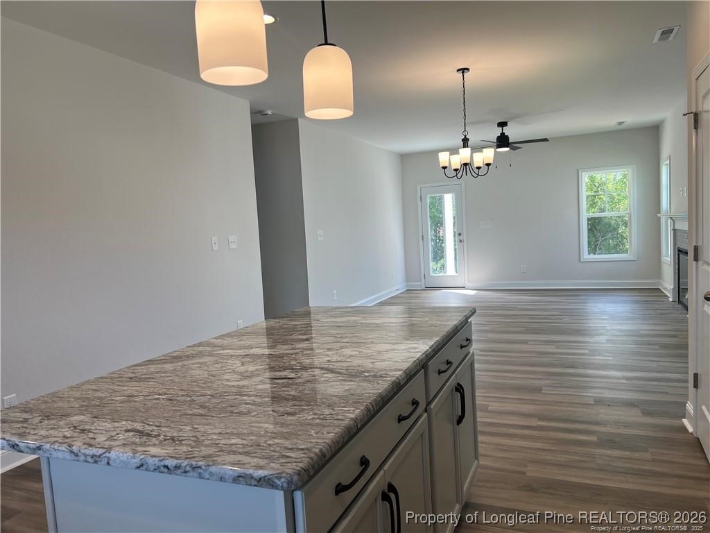 3870 Blackhills Road Fayetteville, NC 28311 - Photo 4 of 22 an empty room with wooden floor
