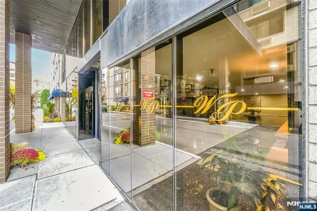 a view of a balcony with dining area