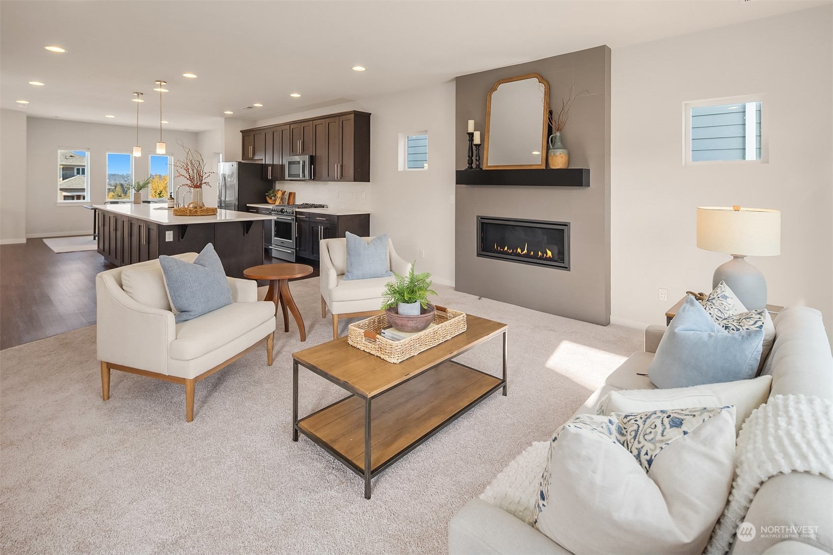22607 42nd Drive Southeast Bothell, WA 98021 - Photo 11 of 26 a living room with furniture and a fireplace
