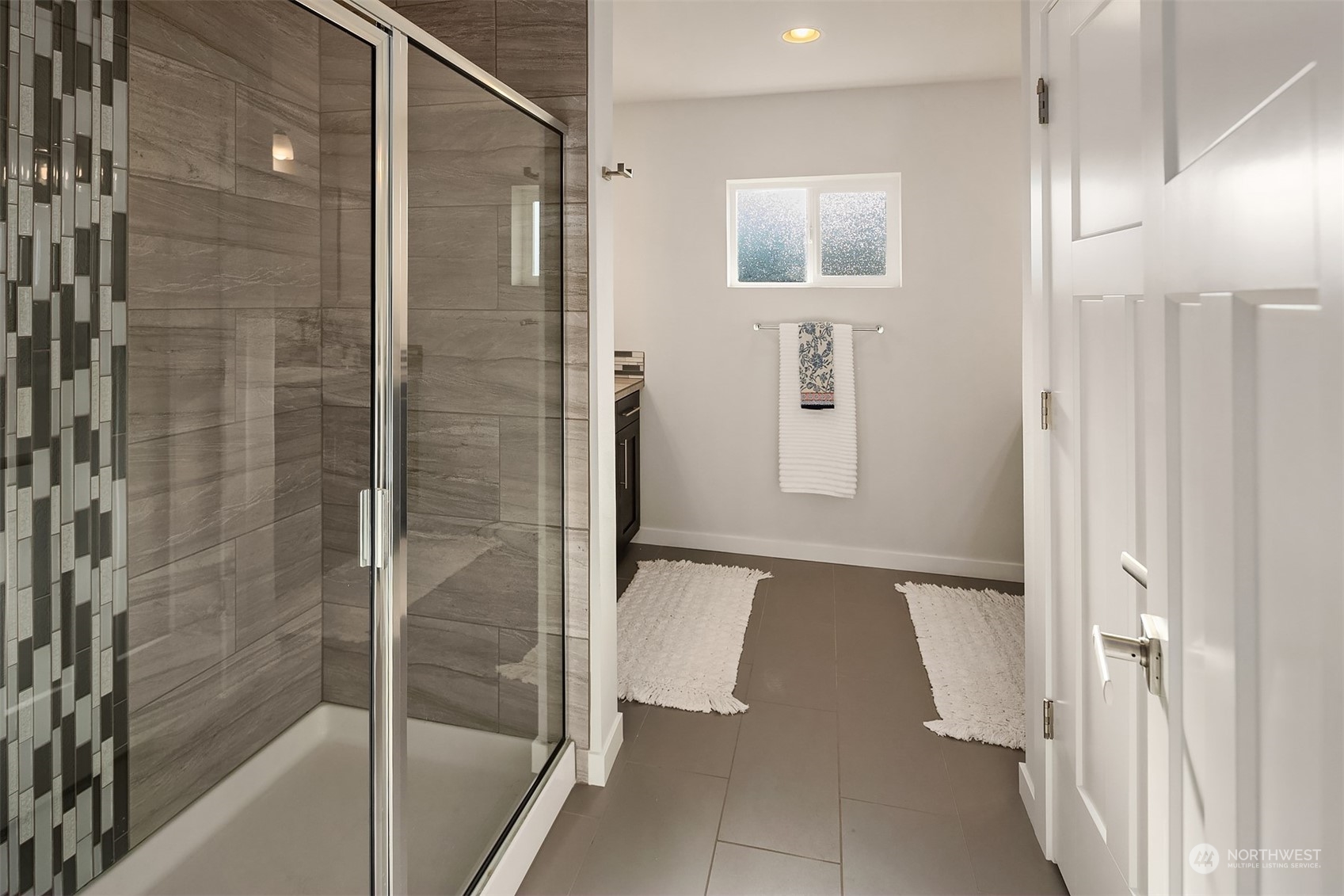 22607 42nd Drive Southeast Bothell, WA 98021 - Photo 14 of 26 a bathroom with a bathtub and shower