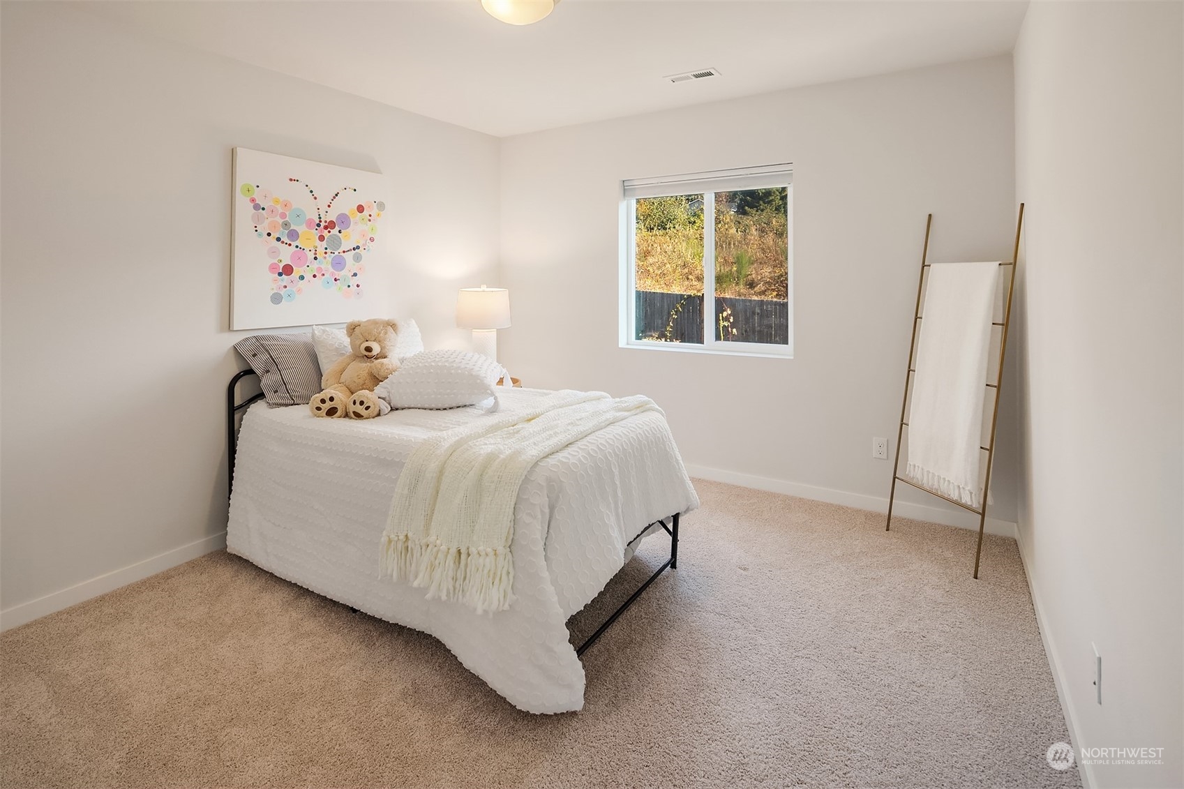 22607 42nd Drive Southeast Bothell, WA 98021 - Photo 16 of 26 a bedroom with a bed and a window