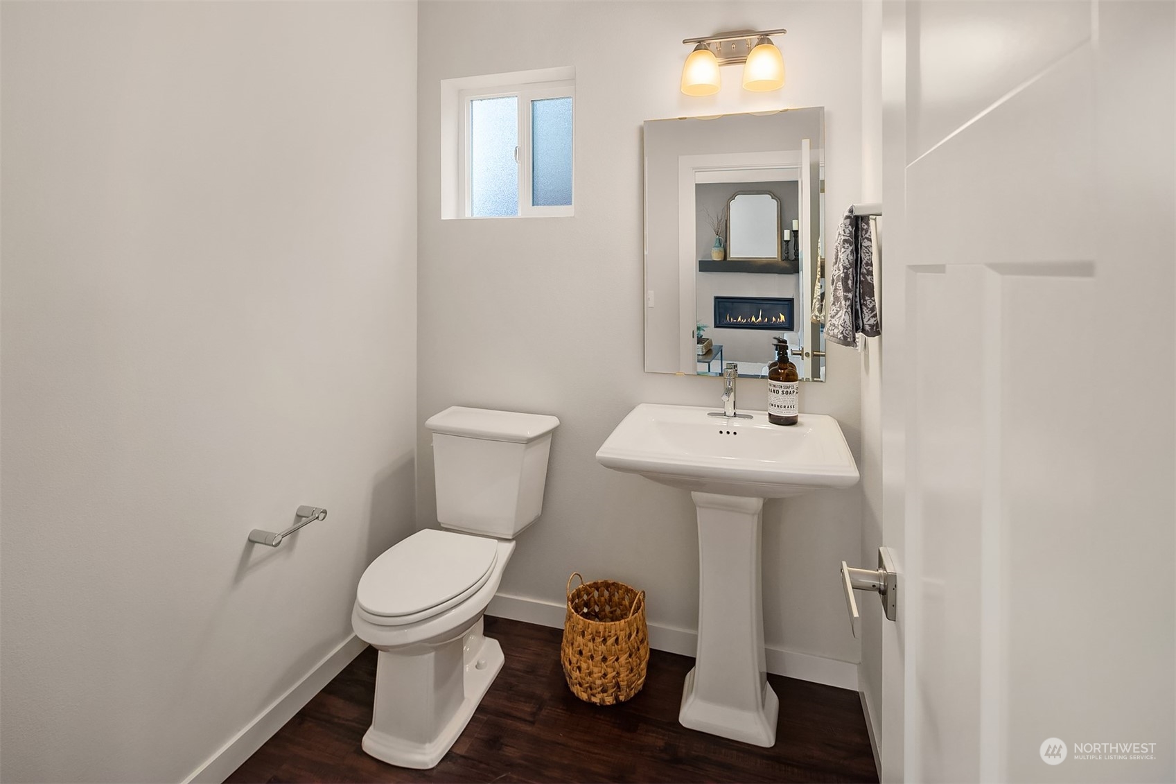 22607 42nd Drive Southeast Bothell, WA 98021 - Photo 20 of 26 a bathroom with a toilet sink and mirror