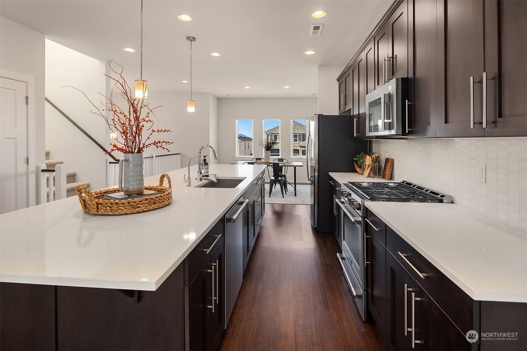 22607 42nd Drive Southeast Bothell, WA 98021 - Photo 6 of 26 a kitchen with counter top space and wooden floor