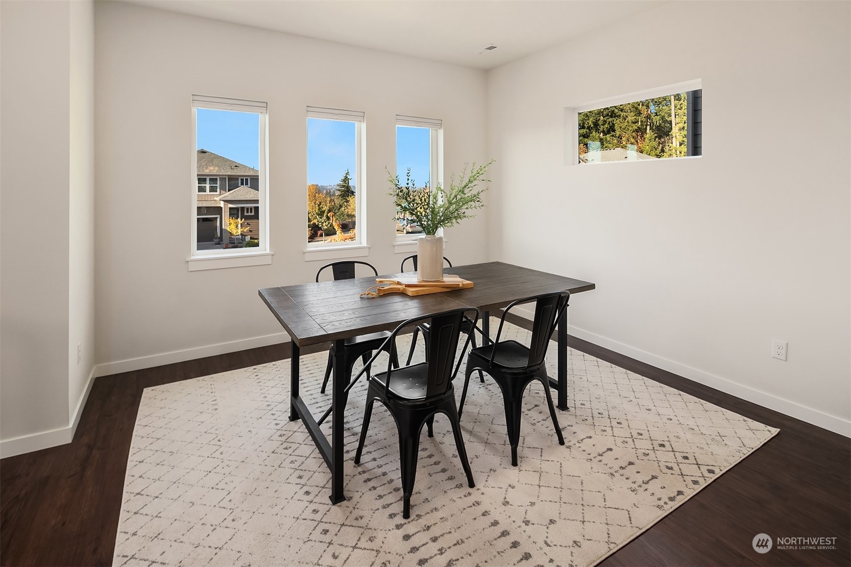 22607 42nd Drive Southeast Bothell, WA 98021 - Photo 7 of 26 a view of a dining room with furniture and wooden floor