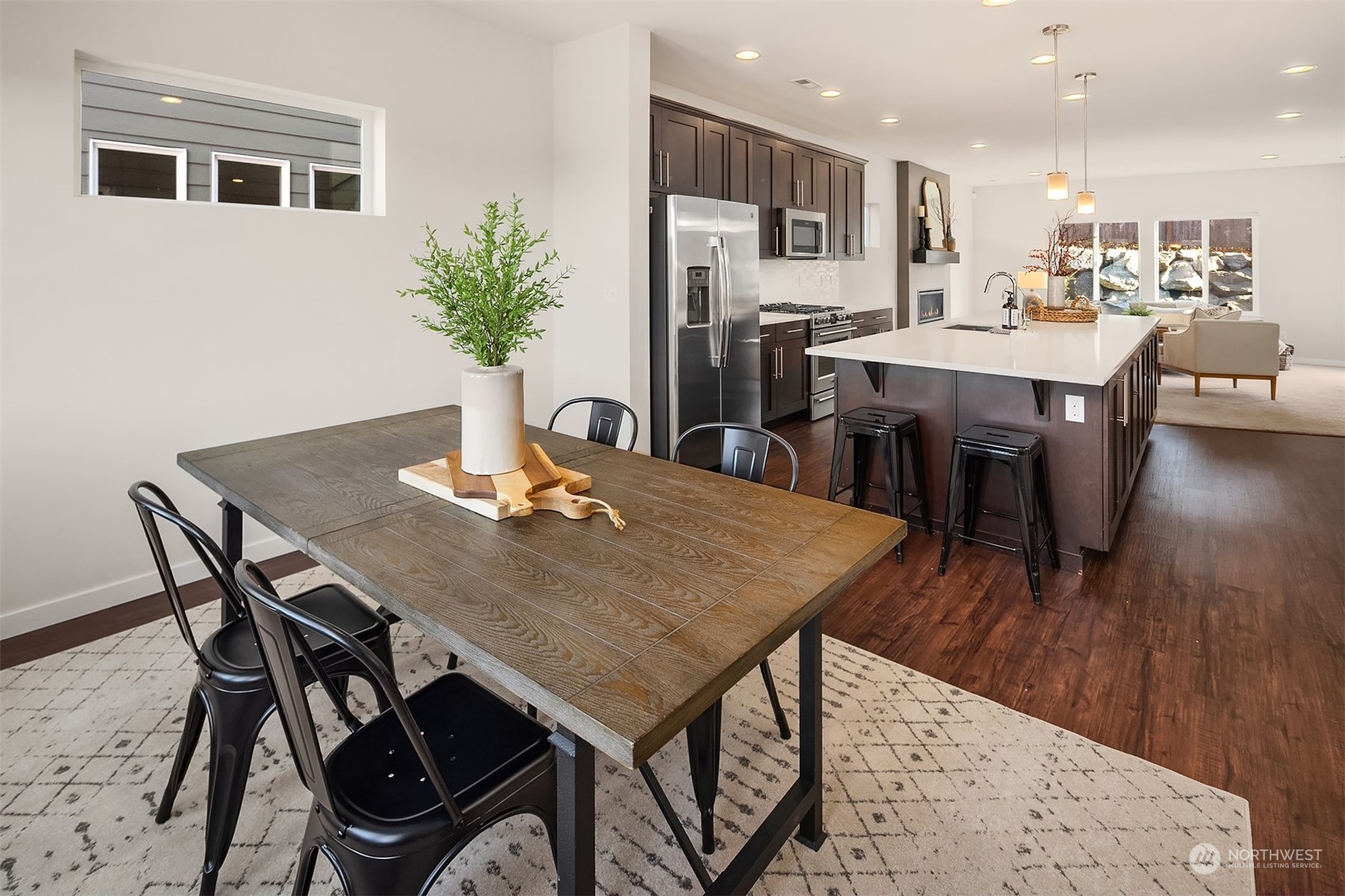 22607 42nd Drive Southeast Bothell, WA 98021 - Photo 8 of 26 a dining room with furniture and wooden floor