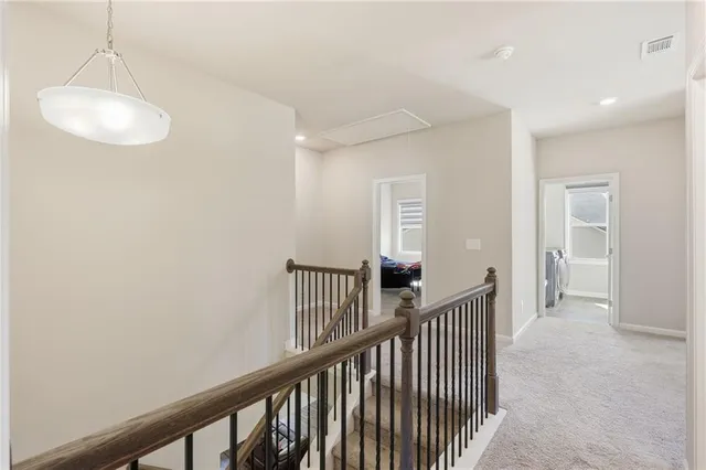 a view of hallway with livingroom