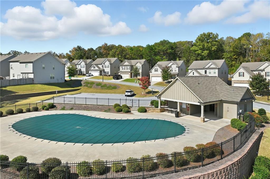 3247 Hawthorne Path Braselton, GA 30517 - Photo 43 of 44 an aerial view of a house with swimming pool residential house and outdoor seating