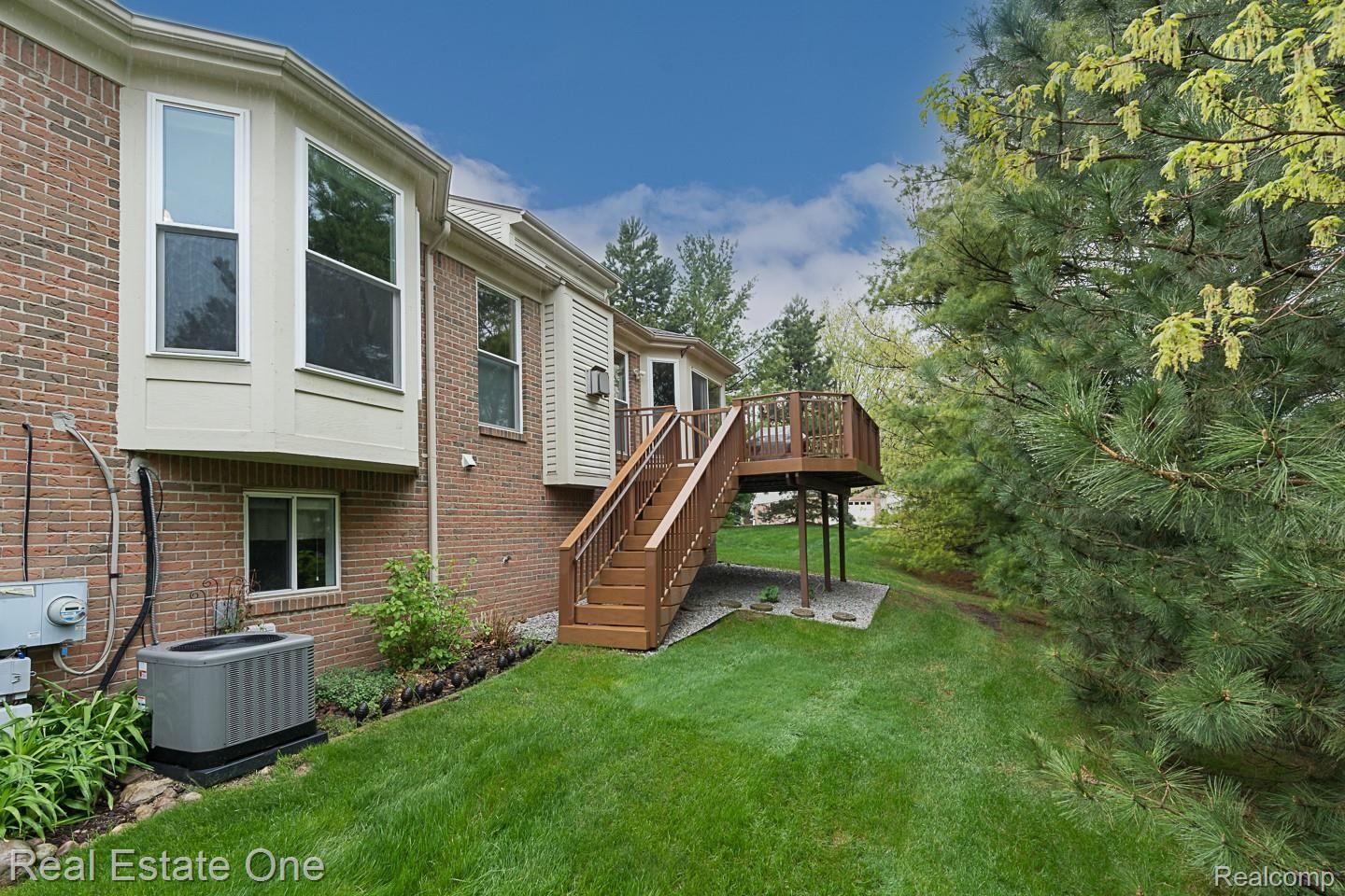 1083 Churchill Circle, Unit 77 Rochester, MI 48307 - Photo 60 of 61 1083 Churchill-View of the backyard