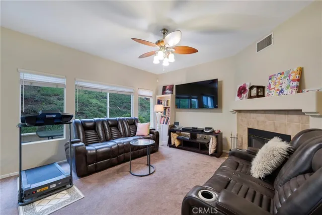 a view of a livingroom with furniture window and outside view