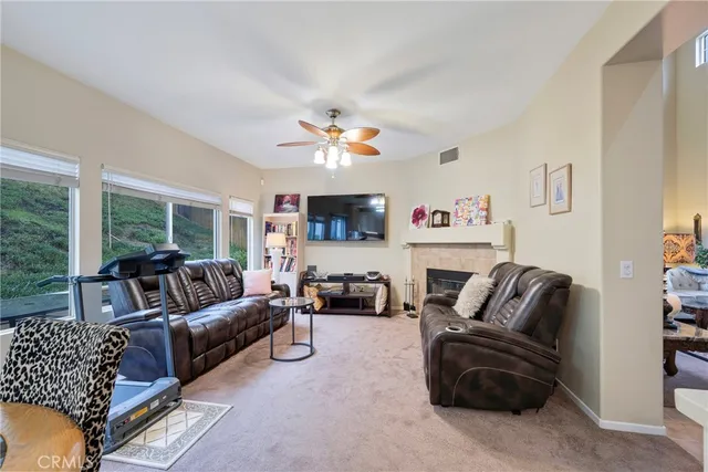 a kitchen with a refrigerator and cabinets