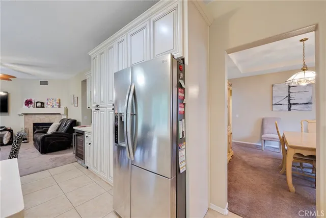 a kitchen with a sink and a large window