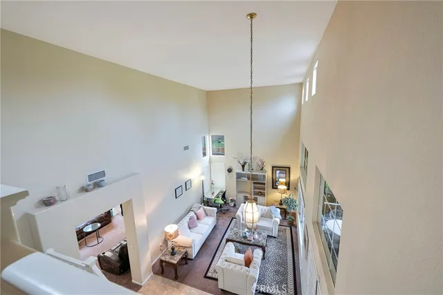 a bathroom with a granite countertop sink mirror and toilet