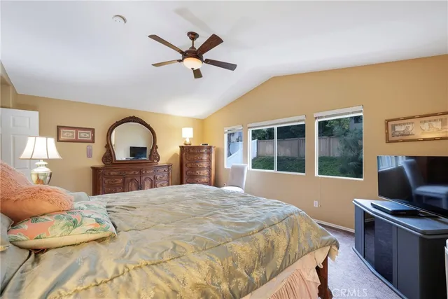 a bathroom with a double vanity sink mirror and shower