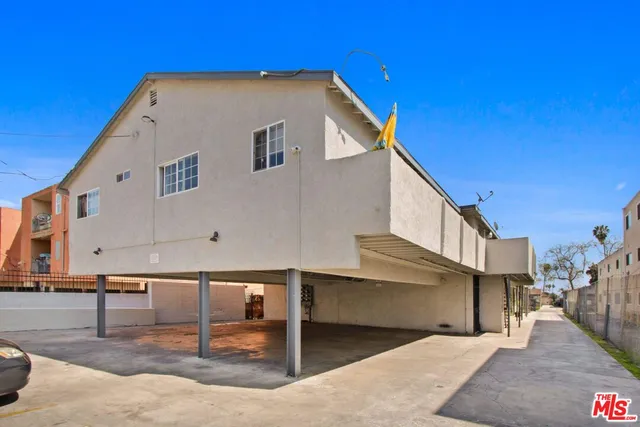 an aerial view of a building with outdoor space