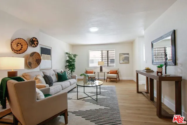 a kitchen with granite countertop a sink stainless steel appliances and cabinets