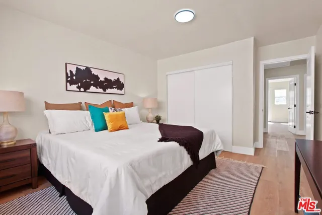 a bathroom with a toilet sink and shower