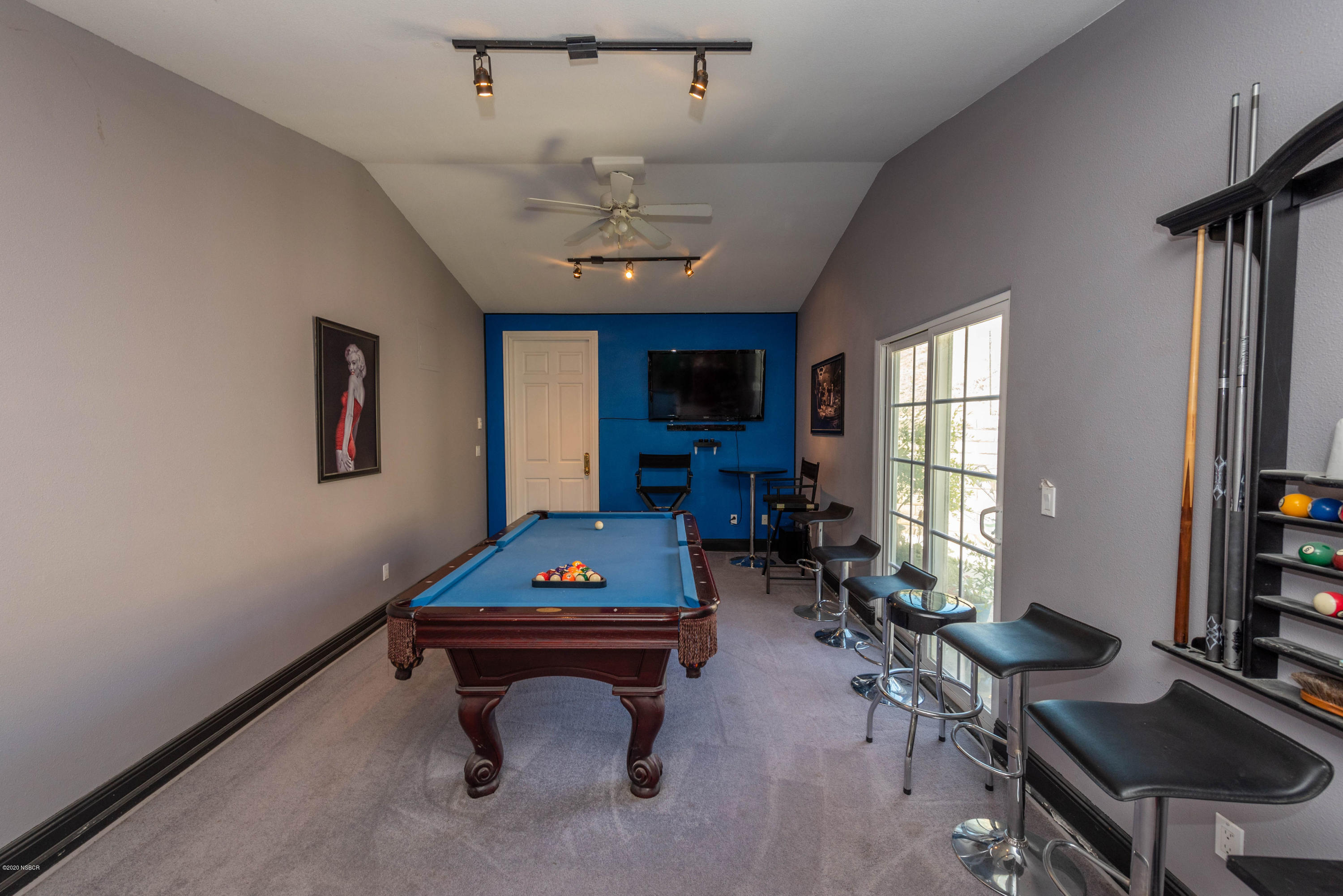 2610 Le Valley Road Lompoc, CA 93436 - Photo 20 of 36 a room with furniture pool table flat screen tv and windows