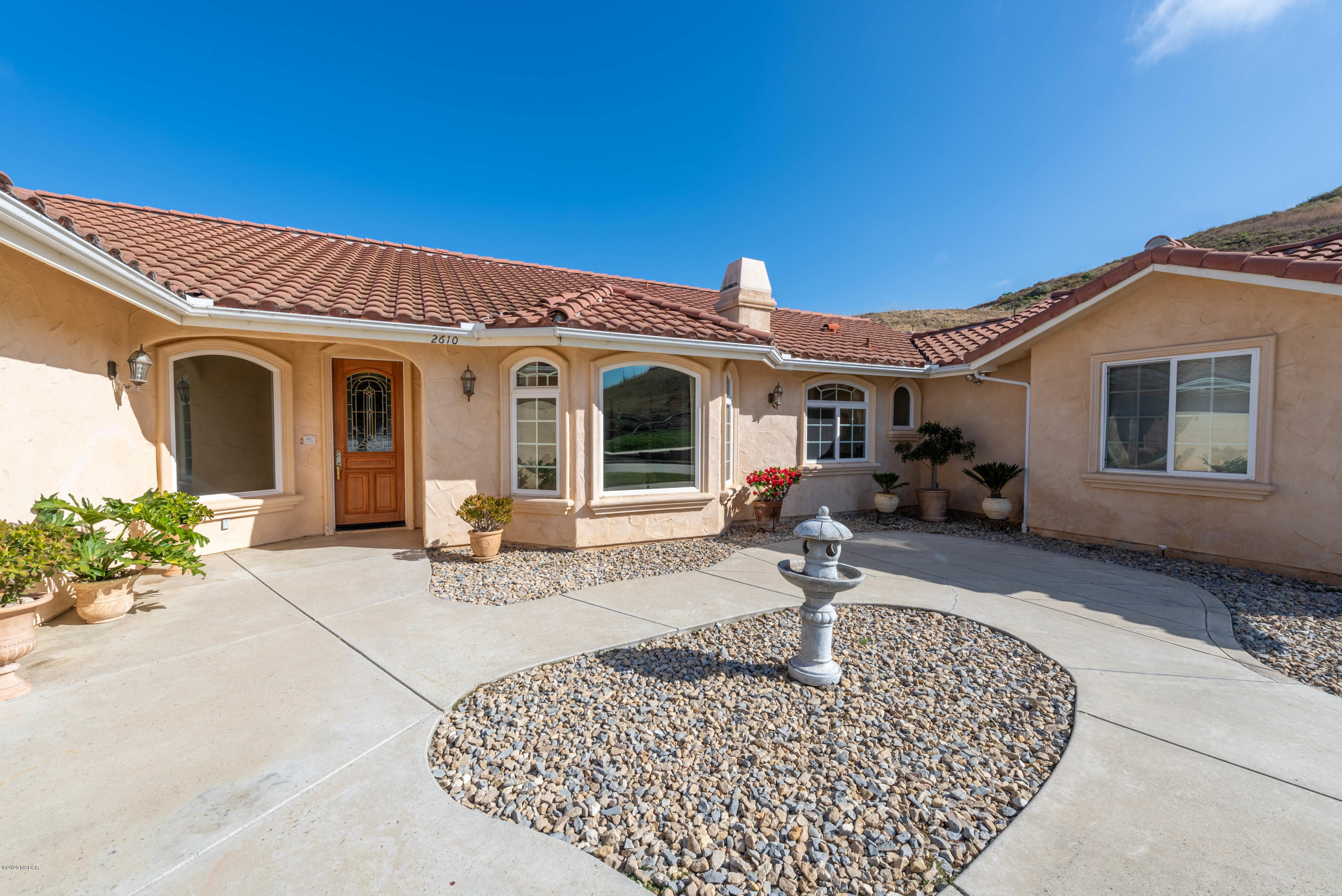 2610 Le Valley Road Lompoc, CA 93436 - Photo 2 of 36 a front view of a house with garden