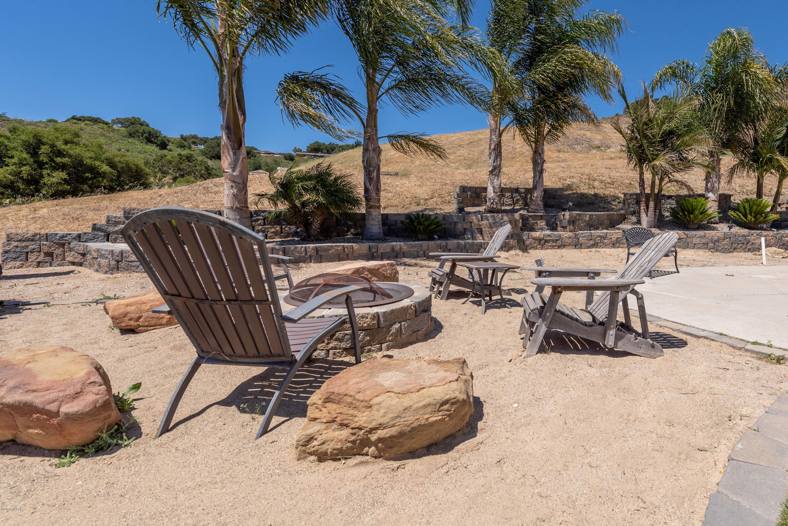 2610 Le Valley Road Lompoc, CA 93436 - Photo 22 of 36 a view of a backyard with a sitting area with furniture