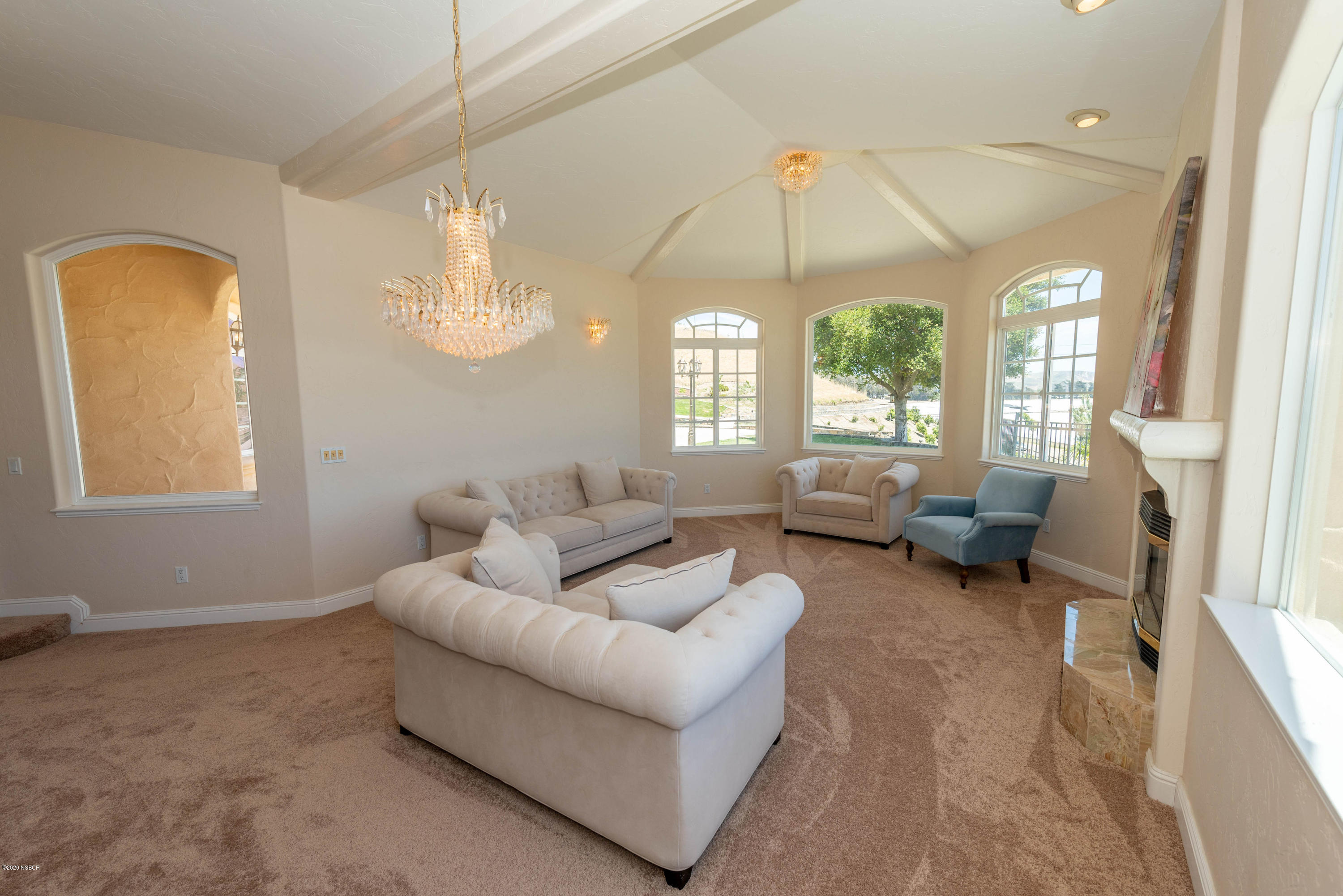 2610 Le Valley Road Lompoc, CA 93436 - Photo 4 of 36 a living room with furniture and a chandelier