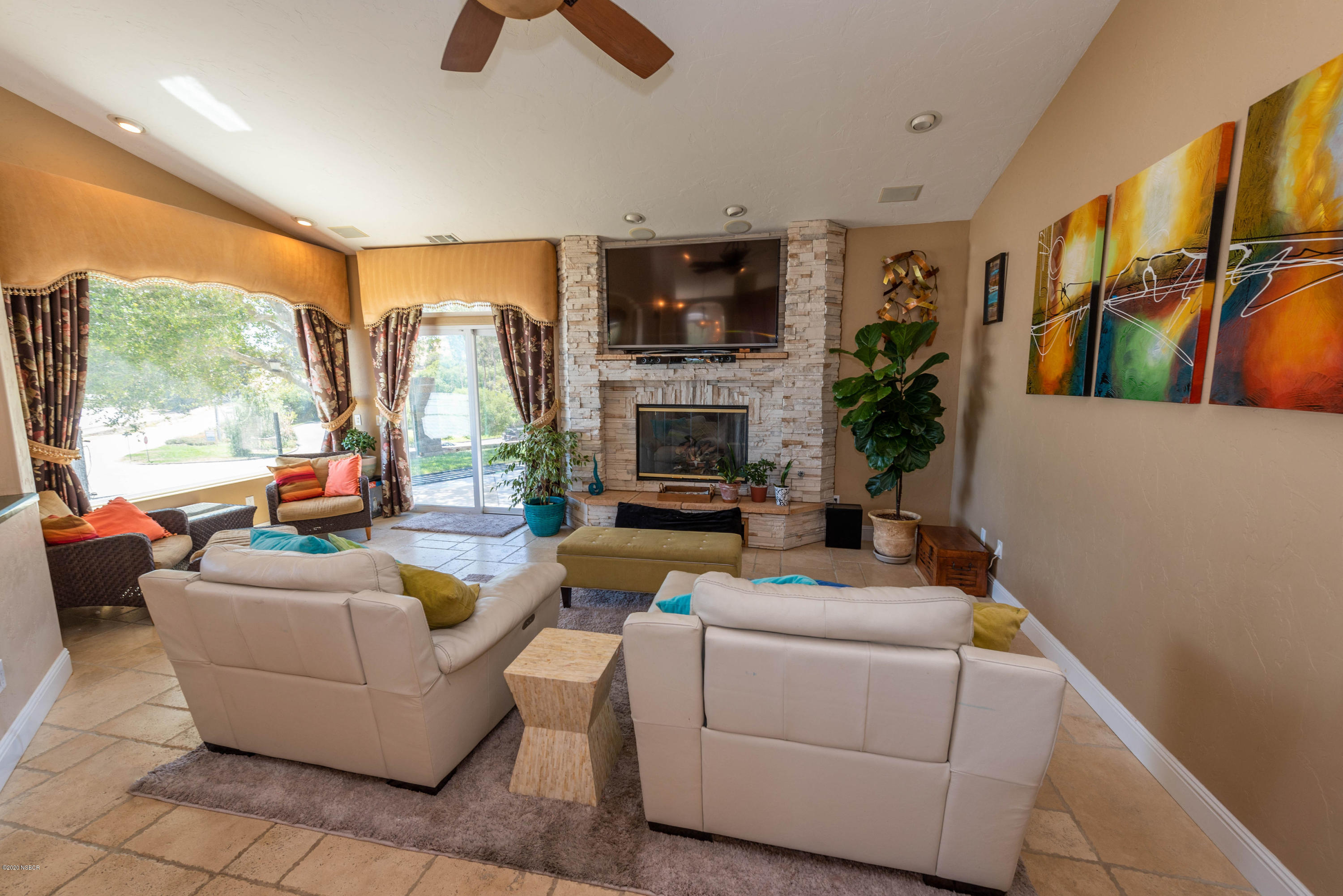 2610 Le Valley Road Lompoc, CA 93436 - Photo 7 of 36 a living room with fireplace furniture and a large window