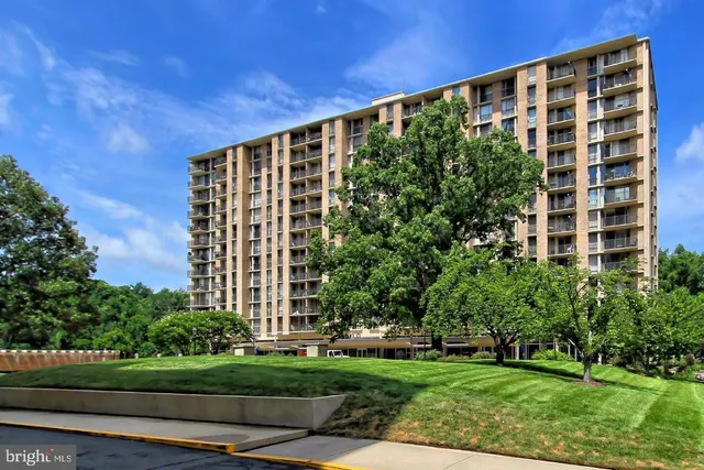 front view of a building with a yard
