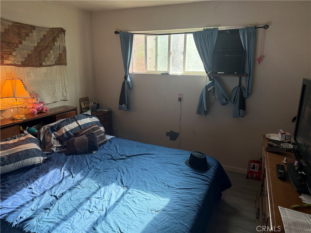 13270 Arrowhead Road Clearlake, CA 95422 - Photo 2 of 11 a bedroom with a bed and a window