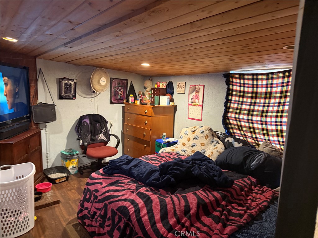 13270 Arrowhead Road Clearlake, CA 95422 - Photo 4 of 11 a bedroom with bed and a large window