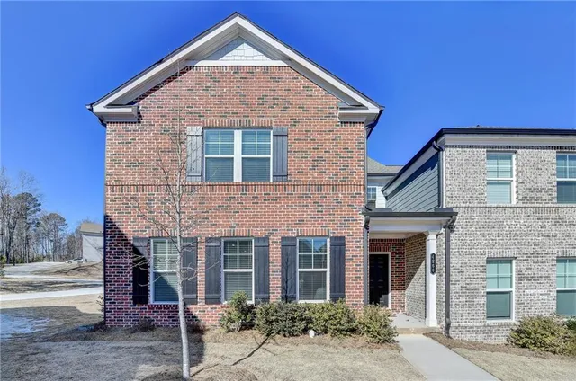 front view of a house with a yard