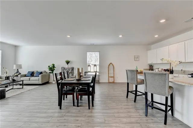 a view of a dining room with furniture