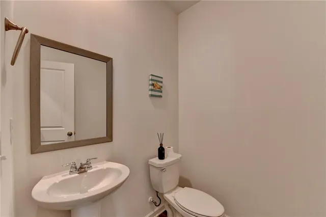 a bathroom with a sink and a toilet