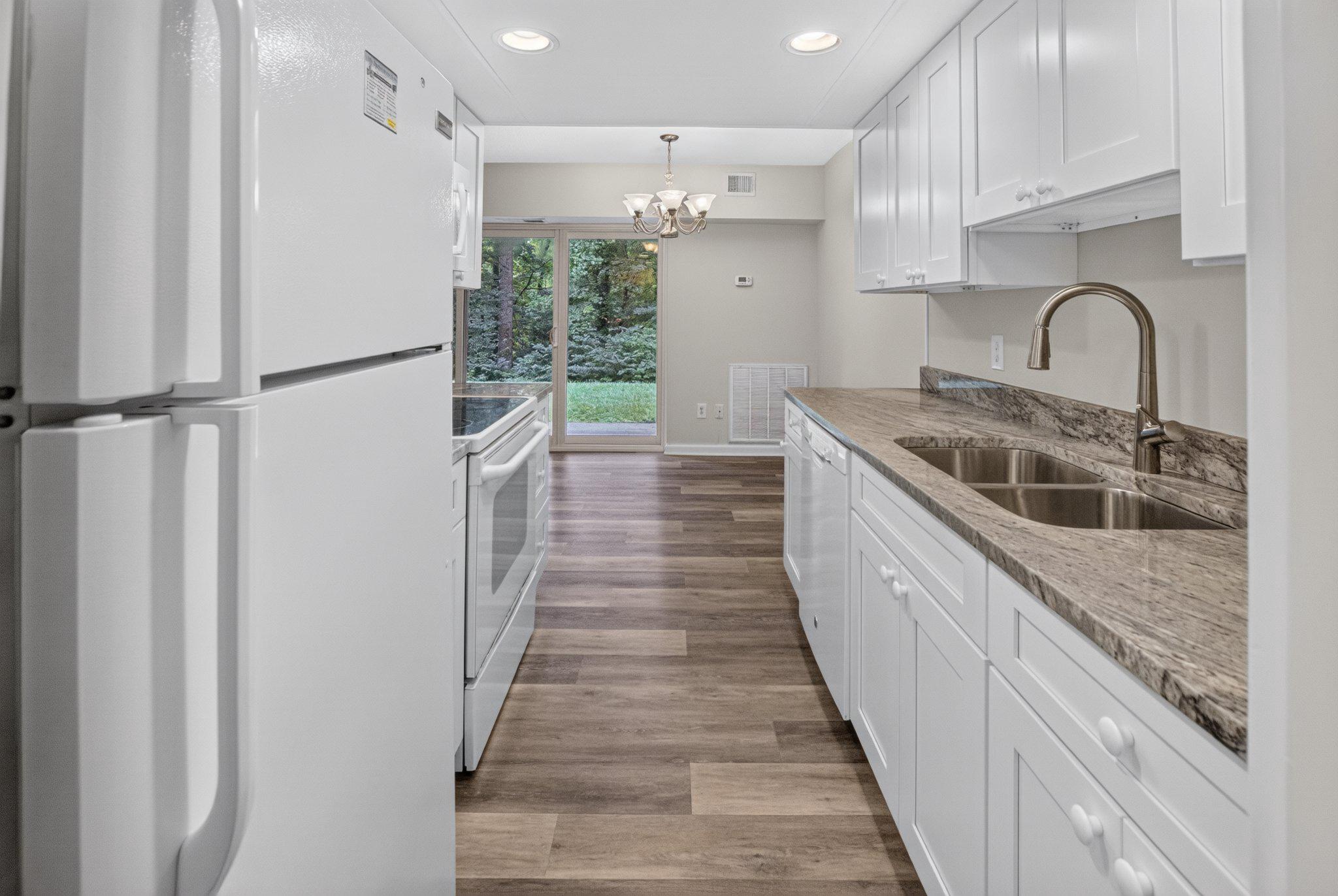 11617 Stoneview Square, Unit 1B Reston, VA 20191 - Photo 2 of 18 Bright kitchen with nature views. View 1 of 4.