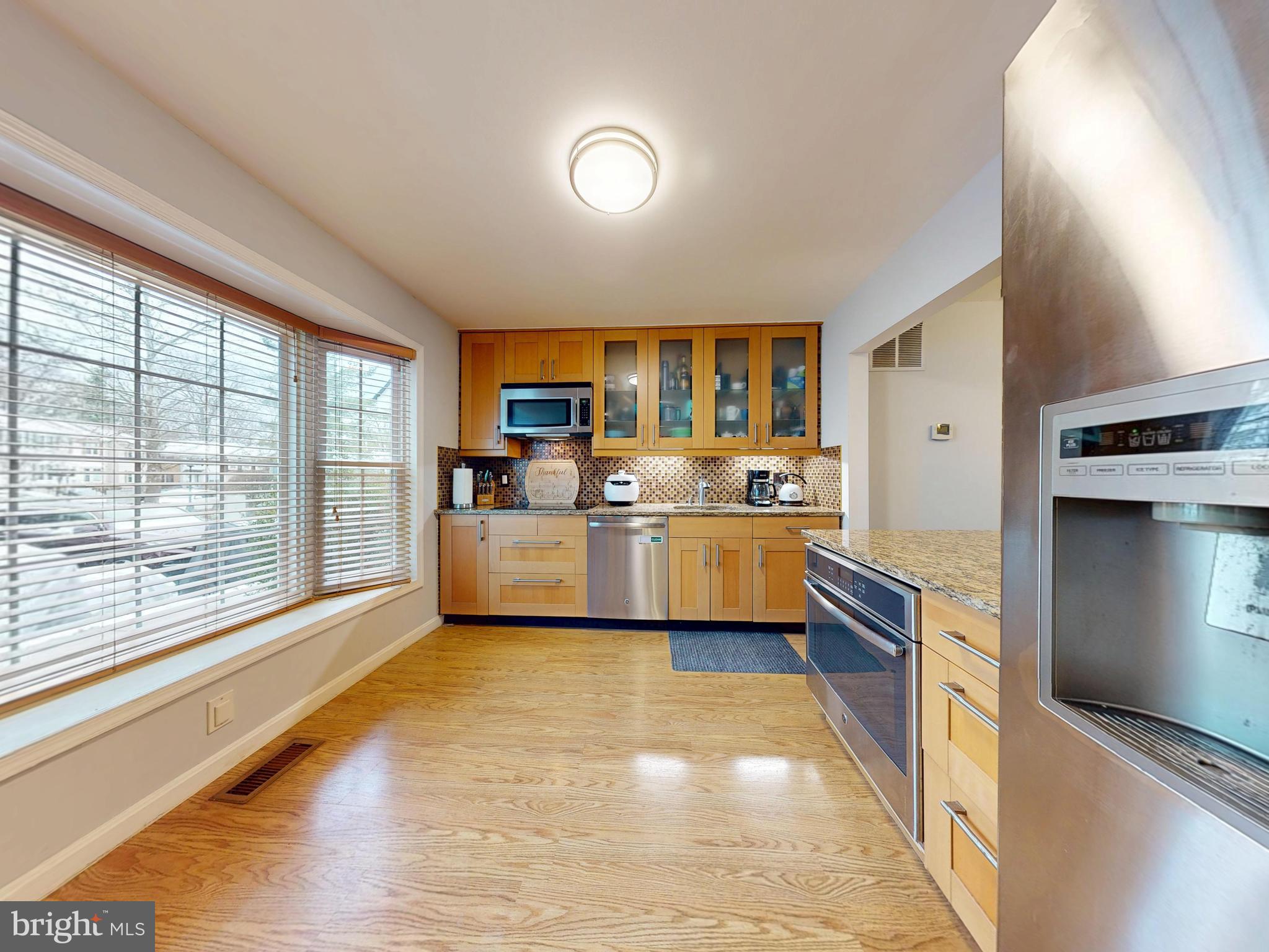 7302 Rolling Oak Lane Springfield, VA 22153 - Photo 5 of 36 Primary floor kitchen