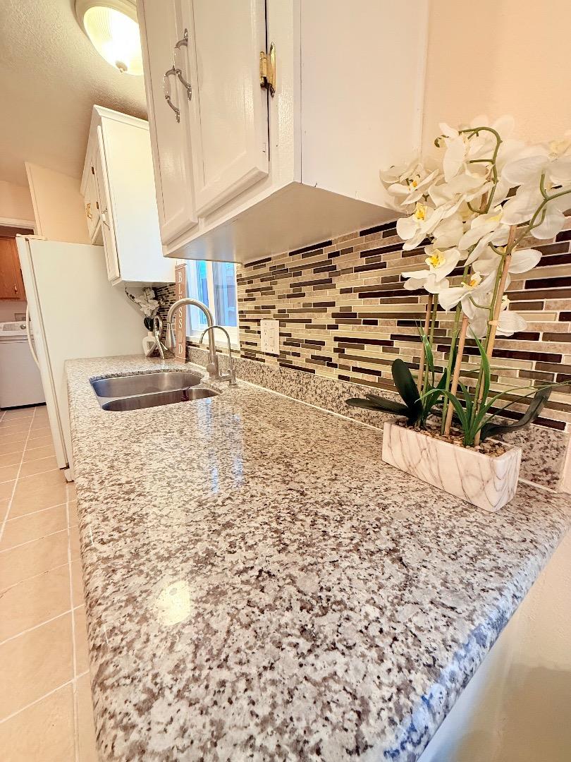 411 Lewis Road, Unit 335 San Jose, CA 95111 - Photo 13 of 27 a view of a kitchen counter top space