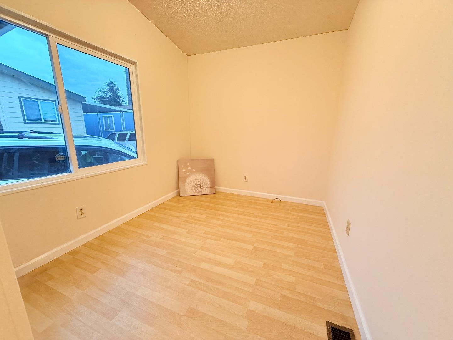 411 Lewis Road, Unit 335 San Jose, CA 95111 - Photo 14 of 27 a view of empty room with windows