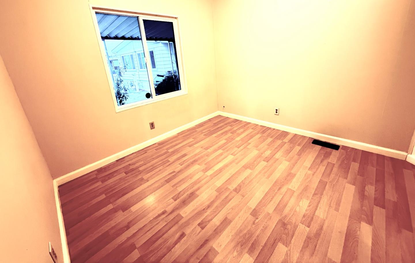 411 Lewis Road, Unit 335 San Jose, CA 95111 - Photo 16 of 27 a view of a small space with wooden floor and a window