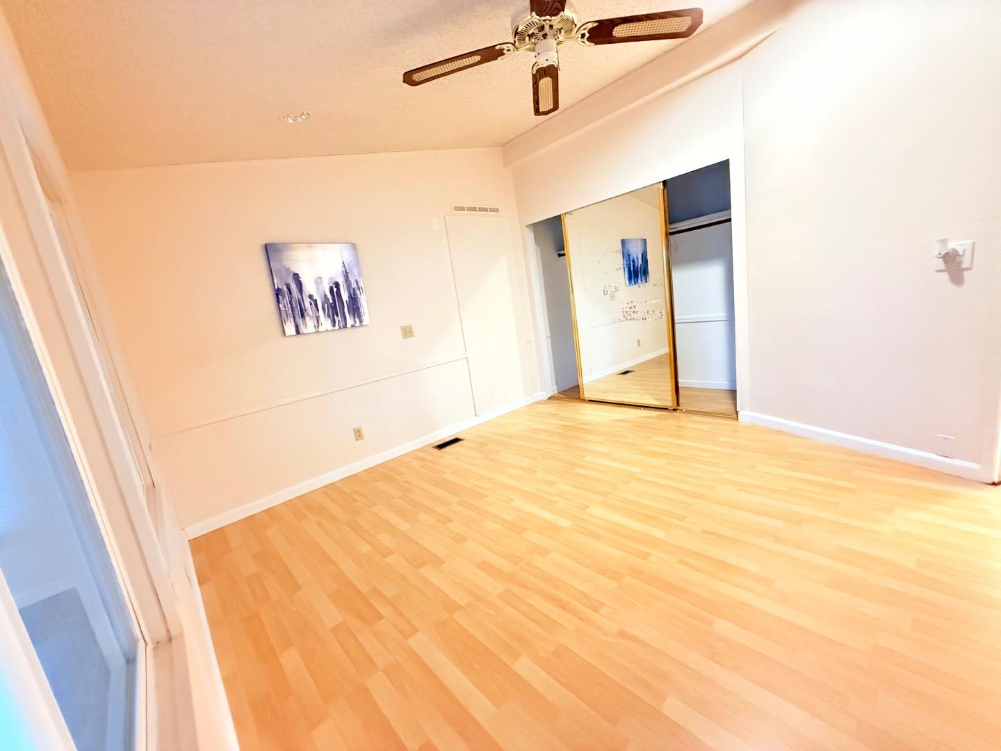 411 Lewis Road, Unit 335 San Jose, CA 95111 - Photo 19 of 27 a bedroom with a large bed