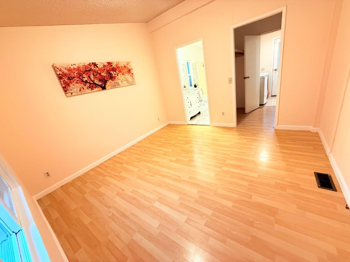 411 Lewis Road, Unit 335 San Jose, CA 95111 - Photo 21 of 27 a view of a room with wooden floor