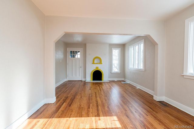 a view of entryway with wooden floor