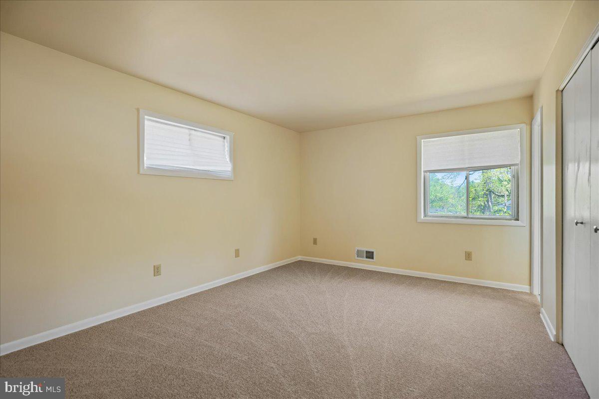 4227 Kinmount Road Lanham, MD 20706 - Photo 13 of 27 an empty room with a window