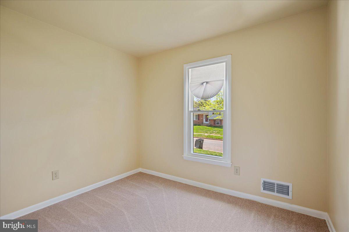 4227 Kinmount Road Lanham, MD 20706 - Photo 15 of 27 an empty room with windows