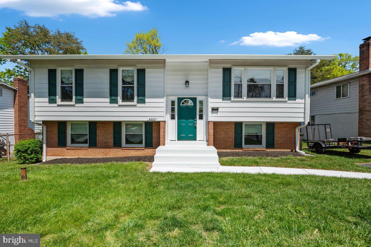 4227 Kinmount Road Lanham, MD 20706 - Photo 2 of 27 a front view of a house with a yard